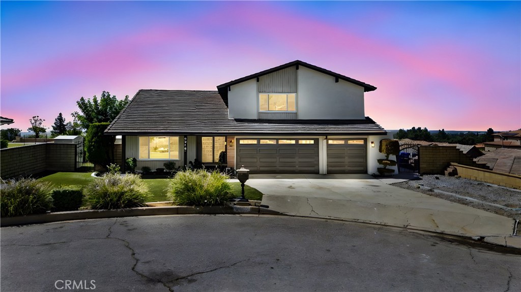 Perched in the highly sought-after Foothills of North Rancho Cucamonga, this beautifully remodeled home offers breathtaking panoramic city and mountain views, complemented by a rare blend of luxury, function, and location. Step inside to be greeted with high vaulted ceilings. The main level offers a well-planned layout with excellent flow from room to room. Each space offers a sense of openness while still providing subtle separation—perfect for both entertaining and day-to-day living. This home’s interior has been completely transformed featuring a gourmet kitchen that is a showstopper, boasting new cabinetry, quartz countertops, a chic subway tile backsplash, an eye-catching accent wall and brand-new stainless-steel appliances. The kitchen opens to the dining room, offering an inviting space for gatherings. Gorgeous waterproof laminate flooring has been installed throughout the home, as well as stylish railings, and divine light fixtures. Designed for entertaining, the living room includes a wet bar, natural stone fireplace, and a retractable movie screen. This expansive residence offers 4 bedrooms and 3 fully remodeled bathrooms, including a downstairs bedroom and full bath—perfect for guests or multi-generational living. The downstairs bath also provides direct backyard access for added convenience when enjoying the pool. The spacious primary suite features a cozy fireplace, large walk-in closet, and a luxurious ensuite bathroom with dual sinks, a soaking tub, and an elegantly tiled walk-in shower. Enjoy private moments on your own balcony with unparalleled city views. Outside, enjoy resort-style living with a sparkling pool and jacuzzi, stunning views, artificial grass in the front and back yards, a retractable security screen, and a new patio cover. The large lot also offers solar, RV parking, and ample space for a guest house or ADU. Located within an award-winning school district, zoned for the highly desirable Los Osos High School, this home combines comfort with exceptional convenience—just minutes from major freeways. Additional upgrades include all-new electrical and plumbing, fresh interior and exterior paint, and energy-efficient features throughout. This is a rare opportunity to own a turn-key home in one of Rancho's most coveted neighborhoods, a definite must-see property!