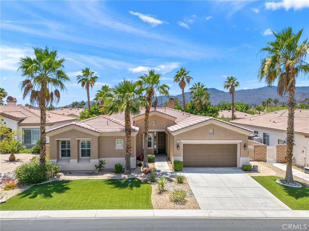 Welcome to 79787 Parkway Esplanade! This gorgeous single story home has been tastefully remodeled and is located in the desirable Esplanade development in La Quinta. As you enter this immaculate home you are welcomed by a large family room with high ceilings and a bright, open feeling. The home features 4 bedrooms (one is currently being used as an office, doors can be added), 2 full bathrooms, a nice open floor plan with a backyard made for entertaining, take a dip in the refreshing pool or relax under the patio complete with fans. The kitchen has been remodeled and has stainless steel appliances and an island perfect for prep work. Both bathrooms have been remodeled as well as new carpeting in the bedrooms, stone wall in family room, new baseboards throughout, updated laundry room, epoxy flooring in the garage, new AC installed in 2024, new pool heater installed in 2023. Almost every inch of this home has been redone. Located near great shopping, dining and schools.