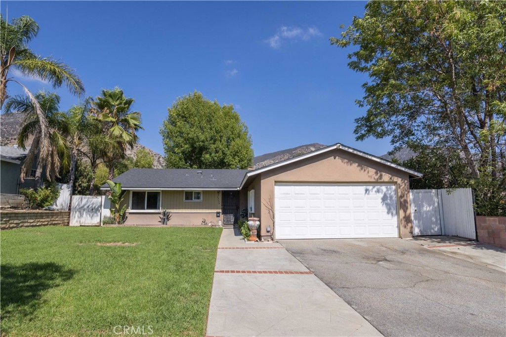 Introducing an outstanding opportunity in one of Sylmar’s most desirable neighborhoods! This beautiful single-story home offers 3 spacious bedrooms and 2 bathrooms, set on a generous 8,474 sq ft lot with 1,588 sq ft of comfortable living space. Step into an open-concept kitchen complete with elegant quartz countertops, rich cabinetry, stainless steel appliances, and convenient counter seating. The kitchen seamlessly connects to the dining area and the inviting family room with a cozy fireplace—perfect for both everyday living and entertaining guests. There’s also a versatile bonus room ideal for a home office, playroom, or additional lounge area. Enjoy endless possibilities in the expansive backyard, ready for you to create your own
outdoor retreat. The property includes a private attached two-car garage with laundry hookups for added convenience. Situated just moments from Mission College (LAMC), El Cariso Park, shopping, dining, and easy freeway access, this home truly has it all.