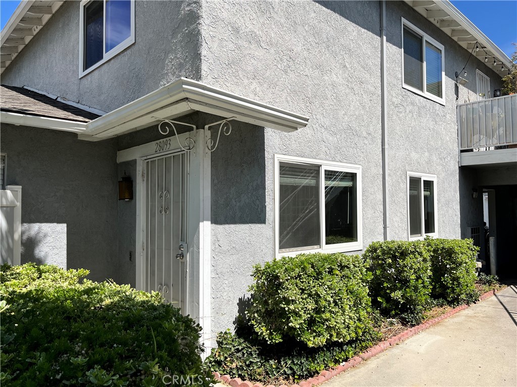 Charming lower-level condominium, 2 bedroom, 1 bathroom located in a quite area of the Bouquet Village Community. This cozy home features granite counter tops in both the bathroom and kitchen with newer cabinets that offer plenty of space. Tile and laminate flooring and newer dual paned windows. The HOA includes a community pool, a sports court and green belt areas.