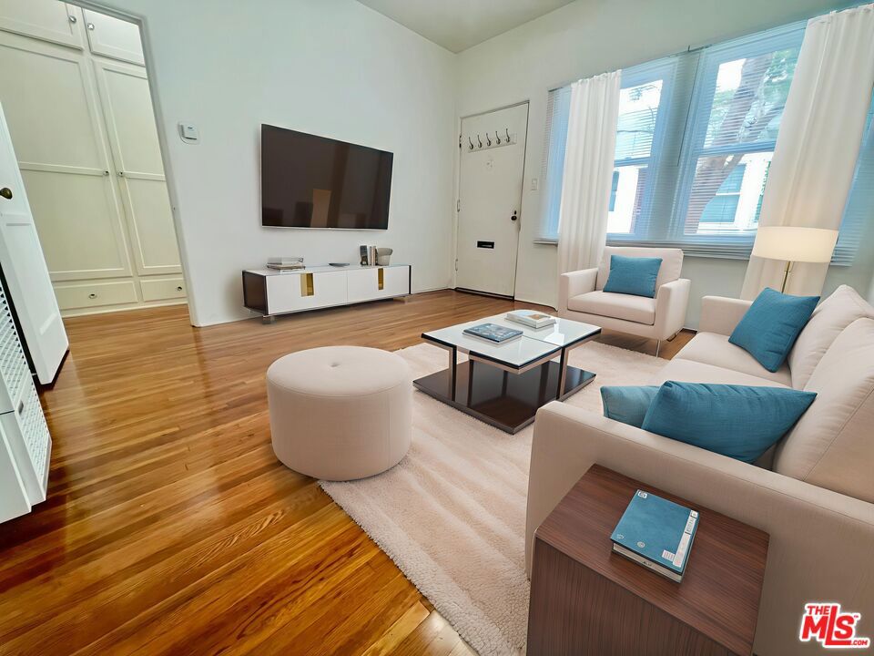 Discover your perfect retreat in the heart of Santa Monica! This charming one-bedroom, one-bathroom corner unit, nestled in an adorable 8-unit complex, offers a cozy living experience. Enjoy ample natural light, hardwood floors throughout, and an updated kitchen with a dining nook. Step outside to your quaint outdoor space, perfect for a lounge chair or some plants. With free on-site laundry and a fantastic central location near restaurants, cafes, and shops, this is the ideal Santa Monica sanctuary! **700+ credit score required