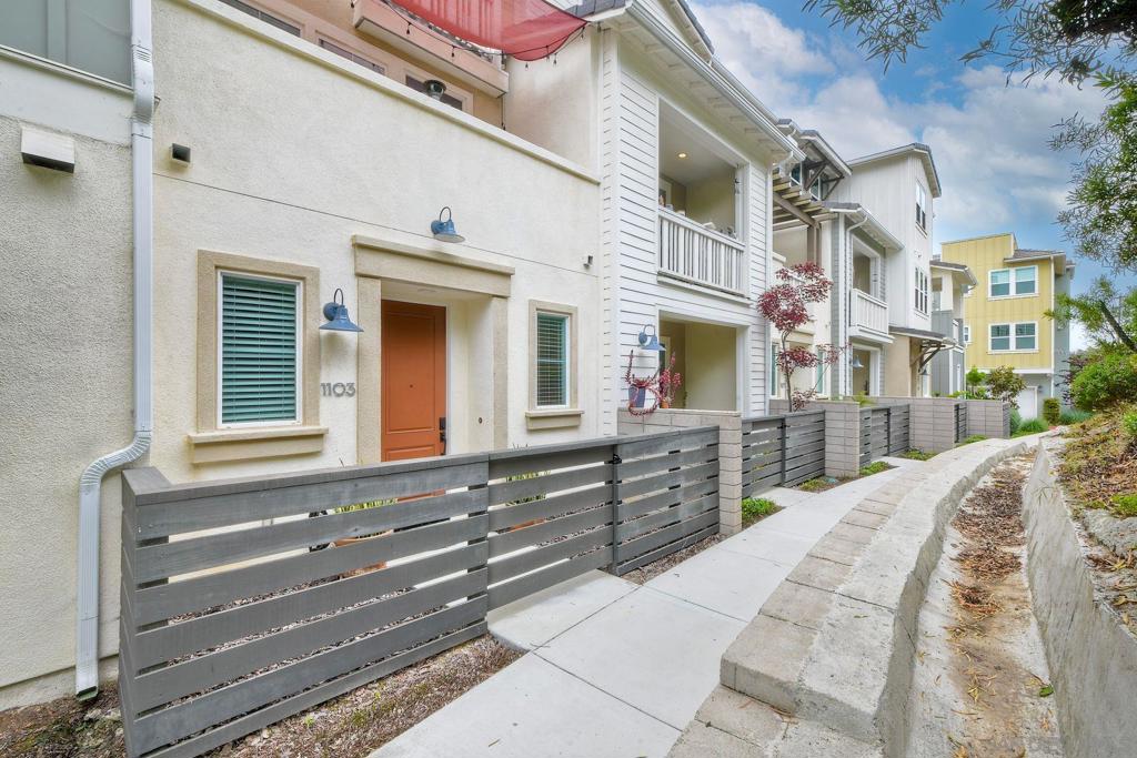 Modern Coastal Living Less Than a Mile from the Beach! Perfectly located within walking distance to restaurants, and parks, this stylish townhome offers the ideal blend of convenience and comfort. Step inside from the spacious tandem garage—complete with bonus storage—and head up to an open-concept main level featuring a beautifully upgraded kitchen with contemporary finishes and ample counter space. Though listed as a 2-bedroom, this home includes an additional flex space that’s perfect for a home office, gym, or guest room. The bright and airy living area overlooks peaceful green space, where the sounds of nature create a tranquil retreat. Upstairs, both bedrooms feature en suite bathrooms and generous walk-in closets, offering comfort and privacy for all. Additional highlights include owned solar, LVP flooring throughout, high ceilings, a vibrant community pool with BBQ and picnic areas, and plenty of guest parking. With its unbeatable location, modern amenities, and thoughtful layout, this home is a rare opportunity!
