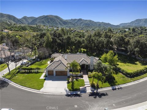 Photo of 15629 Bronco Drive, Canyon Country, CA 91387 (MLS # SR26055545)