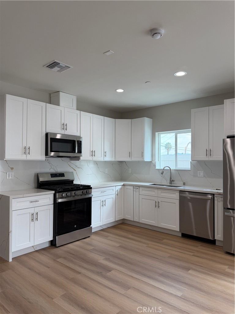 Properties 2 7330 Riverton Ave 1/2