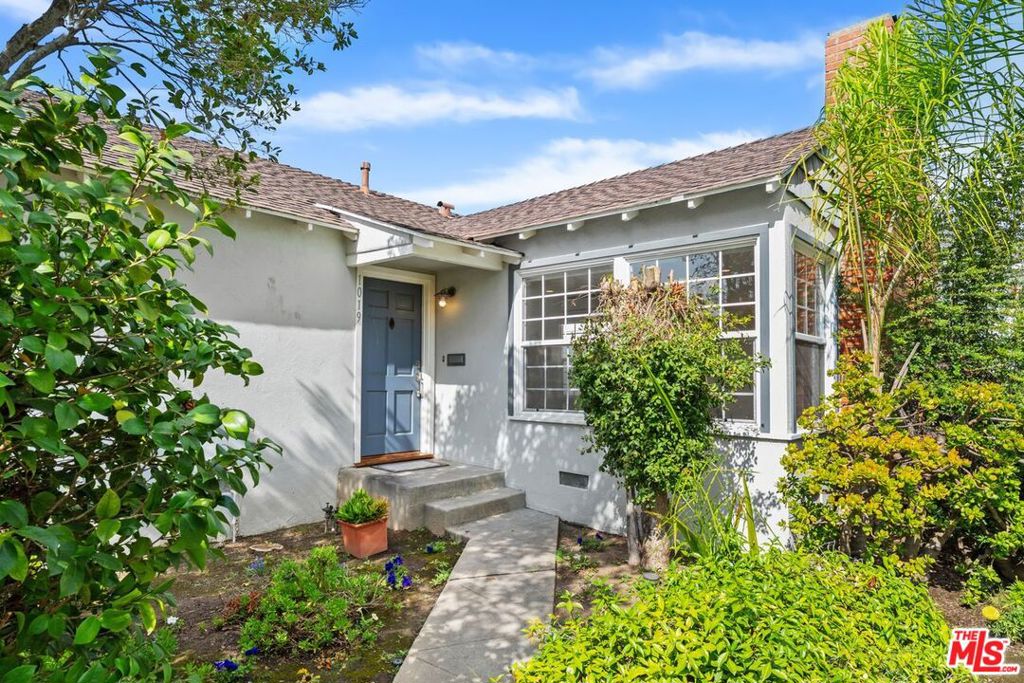 Fully Renovated Traditional in Prime Brentwood Location. Welcome to this beautifully updated 2-bedroom, 1-bathroom home located on a quiet, tree-lined street in the highly sought-after Brentwood neighborhood, one block from Santa Monica. Just north of Wilshire Blvd and east of Centinela, this home offers the perfect blend of peaceful residential living with easy access to top-tier shops, restaurants, and amenities.This home has been completely renovated with designer finishes throughout, featuring brand-new flooring, energy-efficient dual-pane windows, and a spacious, light-filled layout.The stunning kitchen has been fully reimagined with new maple cabinetry, quartz countertops, and premium stainless steel appliances, ideal for everyday living and entertaining. A separate laundry room includes a new washer and dryer for added convenience.The modern bathroom features a custom-tiled shower/tub enclosure and a sleek vanity with quartz countertops. Both bedrooms are generously sized with ample closet space and additional built-in storage. Step outside to a private, gated backyard oasis perfect for entertaining or relaxing under the shade of a mature, fruit-bearing orange tree. The detached two-car garage with remote access offers secure parking and extra storage.Don't miss this move-in-ready home in one of Brentwood's most desirable neighborhoods. A rare find that combines location, style, and comfort!