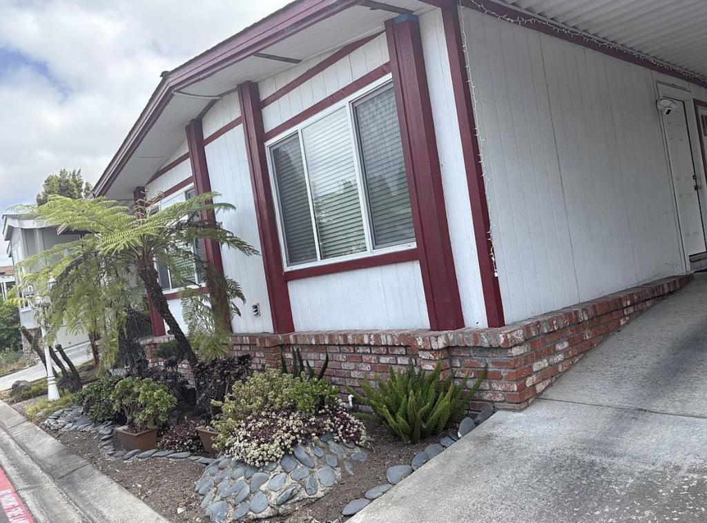 Welcome to this charming 2 bedrooms and 2 bathrooms Triple wide home located in the quiet community. Offering a spacious 1,896 square feet. This home features a spacious Master bedroom with a walk-in closet & extra room for office. Master bedroom has updated bathroom and double pane slides doors leading to outdoor deck for relaxing. The kitchen seamlessly flows into a spacious living room, creating an ideal space for gatherings. Additional living spaces include a separate family room and a dining area. New waterproof vinyl flooring and paintings throughout. New Air Conditioning and outdoor deck. New electric stove, double deck oven and refrigerator. Newer copper pipes. Dual Pane windows for lots of natural sunlight. Huge laundry room with washer and dryer. Coat closet and extra storage. Gated Family Community for all ages. The community amenities features include Clubhouse, pool and green belt area with pond. Walking distance to Shopping Centers (Target, Restaurants, Charging Station, Chase Bank, CVS and many more). Close to a Mission College, Levis Stadium and Great Mall. Easy access to VTA Transit and freeways of 237, 880 and 101 Don't miss the opportunity to make this spacious home become yours!