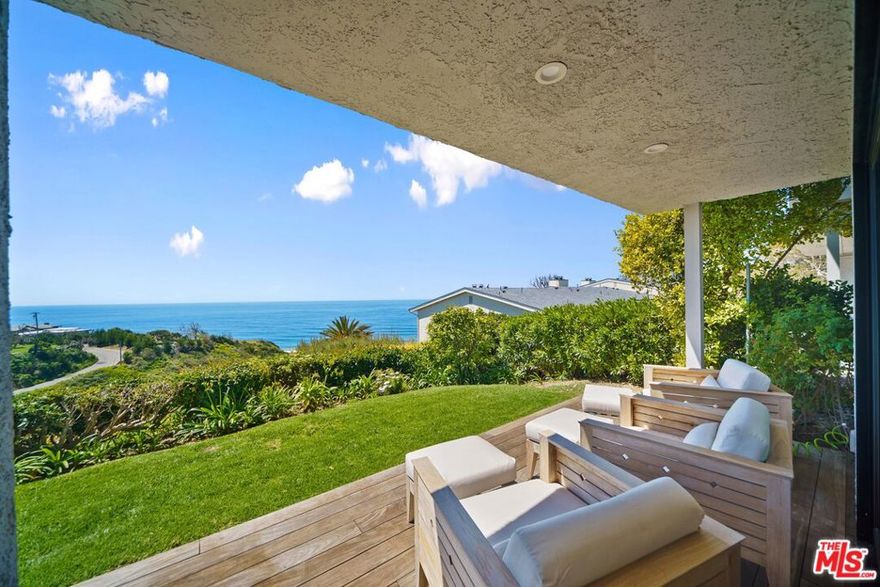 An exceptional bluff-top residence with unobstructed white-water ocean views above Westward Beach.  Fully furnished and available for immediate occupancy.  Located in the prestigious, guard-gated Zuma Bay Villas, this fully renovated end-unit offers privacy, sophistication, and effortless coastal living.  Privately positioned on a quiet cul-de-sac, the home captures panoramic ocean vistas and white water views from multiple rooms and outdoor spaces. Designed for turnkey luxury, it is offered fully furnished with curated pieces, including Restoration Hardware selections, for immediate enjoyment.  The custom floor plan features three spacious bedroom suites upstairs, two with direct, head-on ocean views.  The gourmet kitchen showcases striking Blue Bahia granite countertops and premium Bosch, Sub-Zero, and Miele appliances, opening to a bright living area with sliding glass doors that extend to teakwood decks and a lush garden setting perfect for indoor-outdoor entertaining.  Modern smart-home upgrades include EMTEK keyless entry, Ring security, Lutron lighting, motorized shades, and a Sonos sound system. Additional features include newer HVAC, ceiling fans, water heater, and an immaculate two-car garage.  Zuma Bay Villas offers 24-hour guard gated security, a heated pool and spa, north/south tennis courts, and private beach access via direct steps to the sand.  A rare opportunity to lease a move-in-ready oceanfront retreat with unobstructed views combining modern luxury with the best of Malibu's coastal lifestyle.  Also available for sale @ $4,125,000.