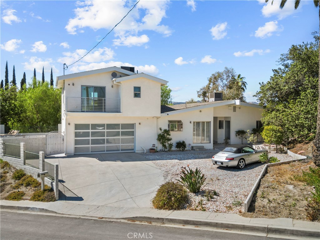 STUNNING – A Must-See Woodland Hills Pool Home!
Nestled in a quiet and highly sought-after Woodland Hills neighborhood, this beautifully upgraded pool home offers comfort, style, and modern convenience with SPECTACULAR VIEWS OF THE VALLEY AND WARNER CENTER. Area also provides some of the most preferred schools in LAUSD.
Featuring 5 spacious bedrooms and 4 bathrooms, the master suite boasts a generous walk-in closet, and all bedrooms include plantation shutters. The home also features a permitted 400 sq. ft. addition with an inviting deck above the garage, complete with built-in planters—perfect for vegetables, herbs, or decorative greenery.
Recent upgrades provide peace of mind and ease of living:
Newer electrical and upgraded panel
Newer roof and two new A/C units
Garage updated with A/C
Newer pool heater
Newer driveway and resurfaced backyard
The open floor plan connects the living area to the updated kitchen, creating a warm, welcoming space for everyday living and entertaining. Outdoors, enjoy the sparkling pool, built-in BBQ, and a Tuff Shed for added storage. All exterior lights are on photo cells for energy efficiency, and the home is secured with a hardwired alarm system.
This move-in ready home combines thoughtful upgrades with resort-style living, making it a true Woodland Hills gem!