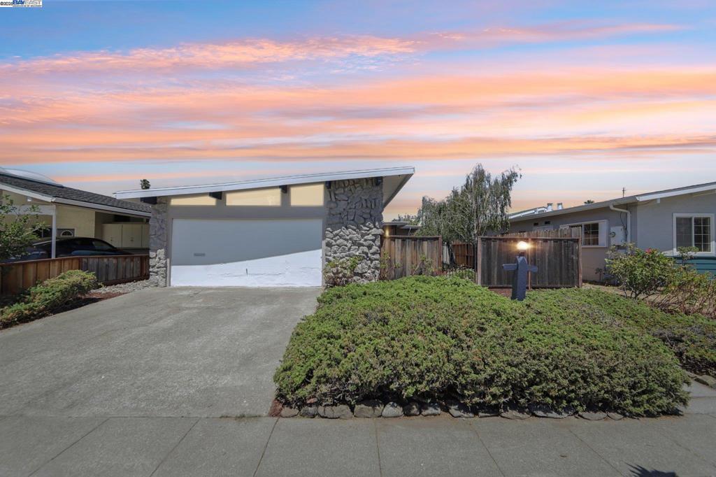 This single-level South Shore home features 3 bedrooms, 2 bathrooms, and a flexible layout with potential for a 4th bedroom. With classic mid-century modern appeal, it boasts vaulted wood ceilings, fresh interior and exterior paint, and luxury vinyl plank flooring that create a warm, modern feel. The open living and dining areas are filled with natural light and offer direct access to the backyard—perfect for relaxing or entertaining. The well-sized front yard and timeless exterior enhance curb appeal, while the driveway and attached 2-car garage provide ample parking and storage. Ideally located near South Shore Center, the beach, shoreline paths, parks, and top-rated schools, this home offers the perfect blend of comfort, convenience, and iconic Alameda living. Don’t miss this opportunity to make your South Shore dream home a reality!