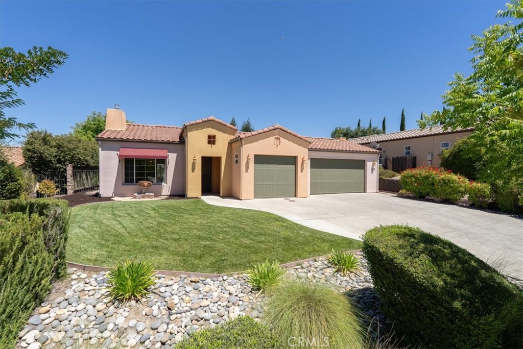 Exceptional Single-Level Living in the Sought-After Del Oro Neighborhood! Welcome to this beautiful 3,000+/- sq. ft. home in the prestigious Del Oro community at Hacienda Hills. Showcasing the popular and spacious “Granada” floorplan, this 4-bedroom, 2.5-bath residence offers the perfect blend of comfort, style, and functionality—ideal for both entertaining and everyday living. Step inside to find a formal living room with a cozy fireplace and a separate dining room accented by custom built-ins. The gourmet kitchen is a chef’s delight, featuring abundant cabinetry, solid surface countertops, an expansive breakfast bar, and an open layout that flows effortlessly into the warm and inviting family room—complete with a second fireplace. Soaring volume ceilings, 8' interior doors, and an abundance of windows create a bright and open ambiance throughout the home, with picturesque views overlooking the landscaped yard and Chandler Ranch hills beyond. The expansive primary suite is your private sanctuary, offering patio access, a massive walk-in closet, and a spa-like en-suite bath with dual vanities, a soaking tub, and separate shower. A large laundry room with utility sink and a finished 3-car garage add everyday convenience, plus owned solar system for energy efficiency. Enjoy the best of Central Coast living outdoors with landscaped yards, expansive concrete patio or basketball court, spa, and two covered patios—perfect for hosting gatherings or enjoying morning coffee. This move-in ready home is a rare opportunity in one of the area’s most desirable neighborhoods. Come see it today—you’ll fall in love!