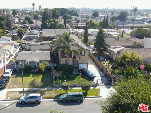 Photo of 422 W 102nd Street, Los Angeles, CA 90003 (MLS # 25603781)