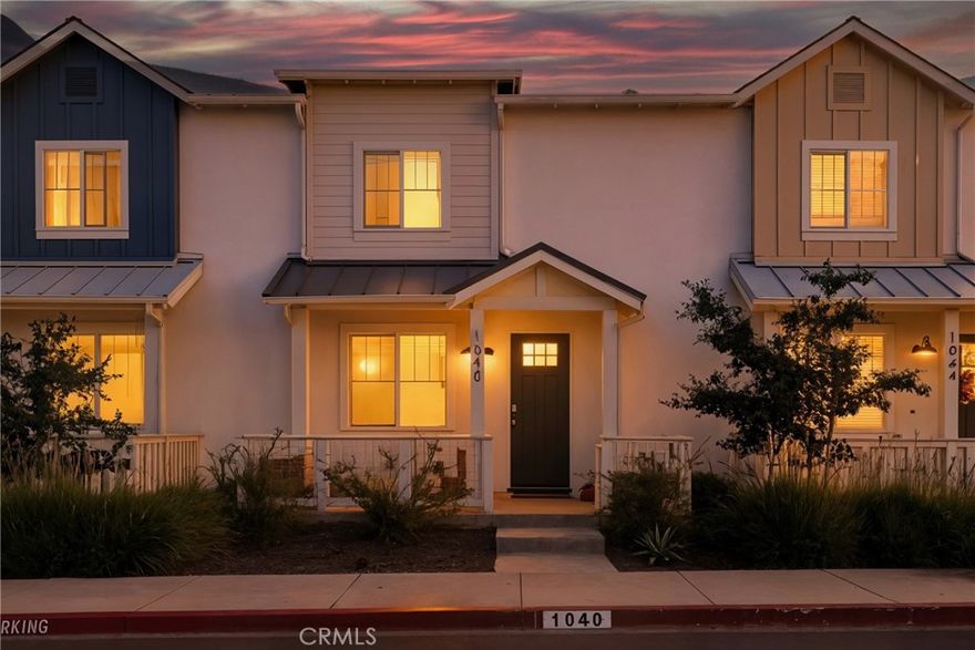Welcome to this move in ready 3-bedroom, 2.5-bath townhome in the highly sought-after Righetti Ranch community of San Luis Obispo. Built in 2022, this home offers a clean, like-new feel with stylish finishes and a layout designed for modern living. Enjoy your morning coffee or unwind in the evening on the charming front porch seating area, an ideal spot to take in the neighborhood’s peaceful setting. Inside, the open-concept main floor is filled with natural light and offers a spacious, airy feel. The kitchen is a standout with sleek quartz-style countertops, a generous walk-in pantry, a breakfast bar, and modern cabinetry. Upstairs, the primary suite offers a quiet retreat with a walk-in closet and an en suite bathroom featuring contemporary finishes. Two additional bedrooms, a well-sized shared bathroom, and a convenient laundry room with a laundry sink complete the upper level. Additional features include a well-proportioned two-car garage, quartz-style countertops in the bathrooms and laundry room, and thoughtfully designed spaces throughout. Plus, with additional guest parking conveniently located just across the street, hosting friends and family is always easy. Located in a newer, established neighborhood, this home is move-in ready and waiting for your personal touch. Buyer and buyers agent to verify all information and do their own due diligence prior to the close of escrow.