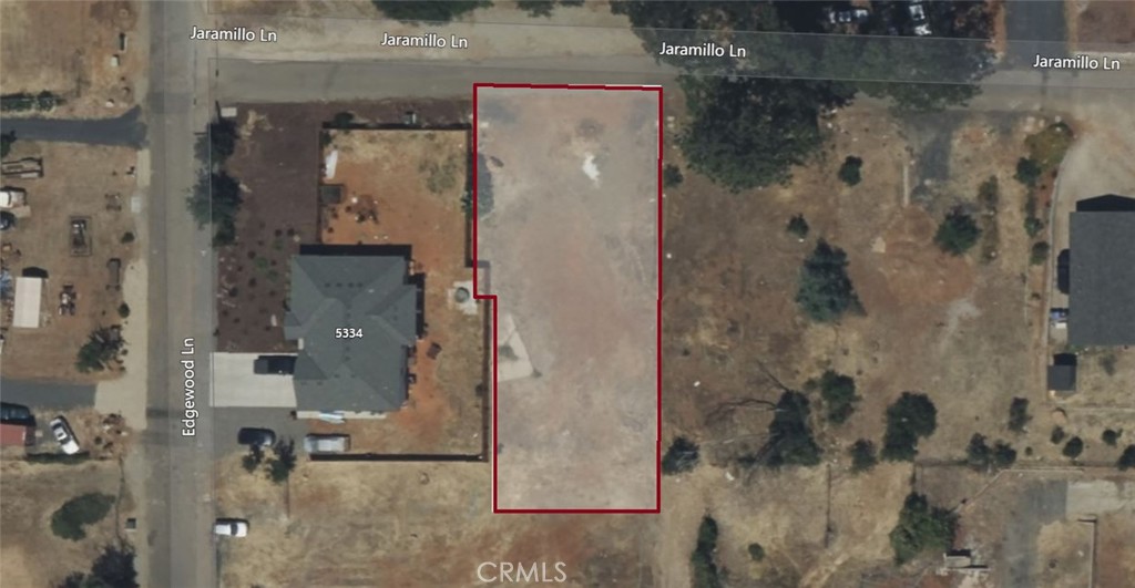 Discover the potential at 1610 Jaramillo Lane. - located on a quiet, established street in Paradise. This spacious lot offers a peaceful setting with trees, a wide driveway, and utilities nearby, making it a great spot to build your next home. Conveniently close to schools, shops, and outdoor recreation, it’s a great opportunity for anyone looking to settle in or invest in this growing community.