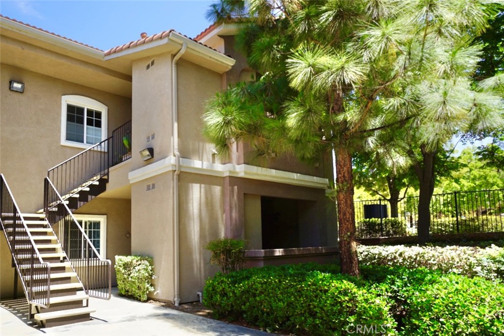 LOOKING FOR AN AFFORDABLE CONDO IN CENTRAL MURRIETA? COME CHECK OUT THIS BEAUTIFUL 2 BEDROOM 2 BATH CONDO LOCATED IN THE GATED COMMUNITY OF THE RESERVES AT MADISON PARK. THIS UPPER LEVEL CONDO HAS AN OPEN LAYOUT WITH LIVING ROOM & FIREPLACE, A DINING AREA AND GOOD SIZE KITCHEN. CONVENIENT IN UNIT LAUNDRY ROOM, EACH BEDROOM HAS ITS OWN SEPERATE BATHROOM, BOTH WITH WALK IN CLOSETS. A COVERED BALCONY TO ENJOY YOUR MORNING COFFEE. PARKING INCLUDES YOUR OWN ONE CAR GARAGE AND AN ADDITONAL ASSIGNED COVERED CARPORT. THEIR IS ALSO GUEST PARKING IN THE COMMUNITY. GREAT OPPORTUNITY FOR AN INVESTOR OR FIRST TIME HOME BUYER. THIS COMPLEX IS VA APPROVED. PLENTY OF SHARED AMENITIES LIKE THE POOL, SPA, GYM, RACQUETBALL COURT, PLAYGROUND. LOCATED NEAR SHOPS, PARKS, SCHOOLS, & FREEWAYS.