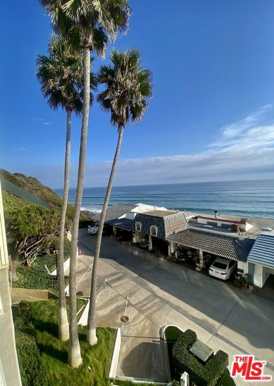 Welcome to Malibu Bay Club - experience the ultimate beachfront lifestyle in this beautifully updated condo, located in one of Malibu's most scenic cove beach communities. Just steps from the sand and surf, this residence is a true ocean lover's paradise. Both bedrooms have stunning ocean views. Bathrooms and kitchen are newly renovated. The kitchen with custom cabinetry, elegant countertops, mosaic tile backsplash, and stainless steel appliances. Hardwood floors add warmth and character. The property owner is installing brand new washer and dryer inside the unit. This is a gated community with secure entry. Two parking spots (one covered). Enjoy access to the beach, community pool, spa and paddle tennis court. Whether you're seeking a serene retreat or an active coastal lifestyle, this condo offers it all.