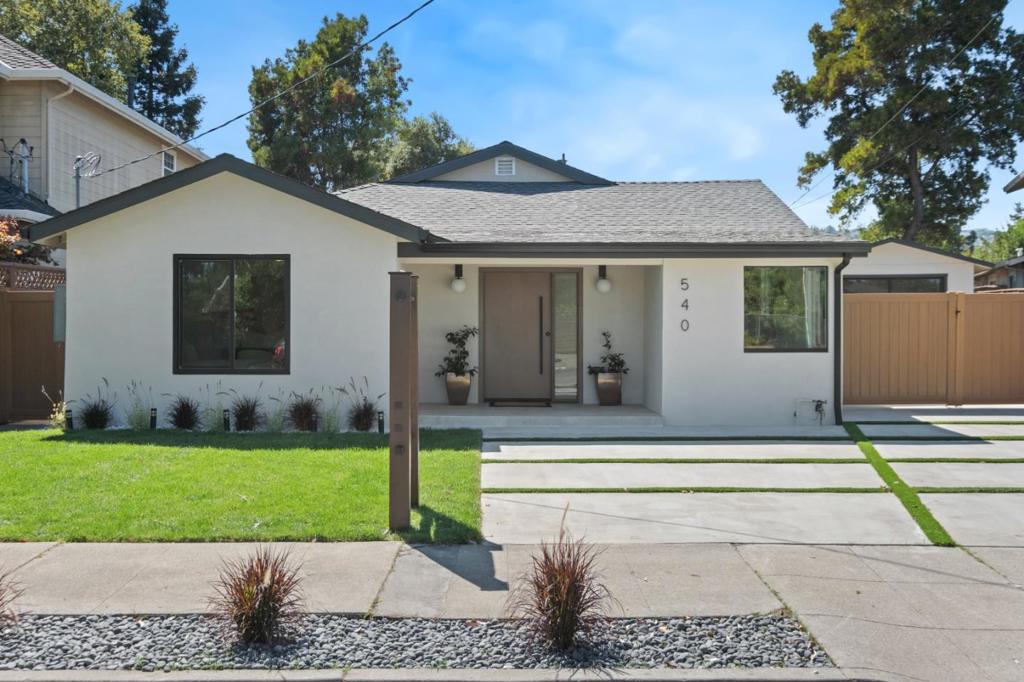 Exquisite, newly remodeled 2025 home. This single-story residence boasts high-end luxury finishes, 4 bedrooms, 2.5 bathrooms, and 2,250 sq. ft. on a flat 10,710 sq. ft. lot. 2025 upgrades include a new roof; central HVAC with Nest thermostat; upgraded 200-amp electrical panel; new aluminum multi-fold patio doors; a vaulted ceiling with skylights; and new dual-pane Low-E windows. New electrical wiring and copper plumbing. The gourmet kitchen features an oversized island with bar seating and a waterfall design, Taj Mahal quartzite countertops and backsplash, a Thermador 5-burner gas cooktop, built-in oven and microwave, a counter-depth French-door fridge, a walk-in pantry, and European-style cherry wood cabinetry. The primary bath offers a dual vanity with Calacatta marble countertops, a freestanding soaking tub, and a frameless glass shower with rain and handheld fixtures. Outdoors, the property is professionally built with a new smooth-stucco finish, a new concrete driveway and walkway, a wood privacy fence with a lattice extension, a new automatic irrigation system and a sunken garden. Additional highlights include an aluminum garage door with smart-home integration. Minutes from downtown Redwood City, Whole Foods, neighborhood cafes, and Red Morton Park.