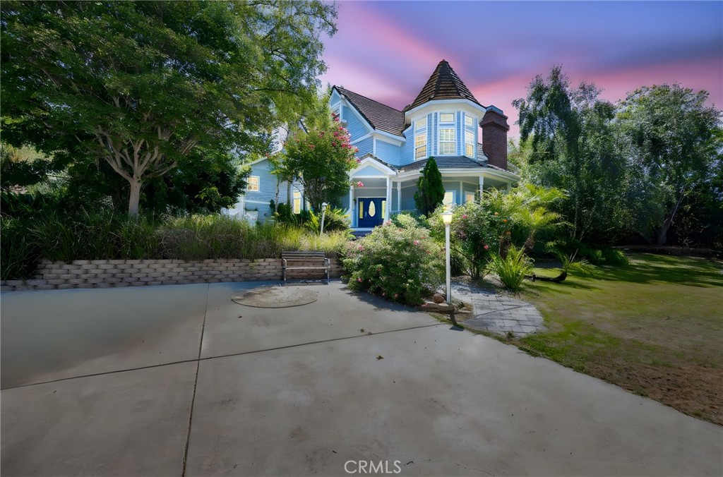 Breathtaking Gated Victorian Estate 7 Bedrooms, Guest Quarters on a private 2.23 Acres! This gated Victorian Estate is truly a work of art, blending timeless elegance with modern comfort. The main home features 5+ bedrooms, 3.5 baths, and a brand-new third-story attic conversion. Attached guest quarters include 2 bedrooms, 1 bath, full kitchen, sitting area, fireplace, and private deck,ideal for multi-generational living or rental income.
The gourmet kitchen offers granite countertops, Bosch dishwasher, DACOR oven/range with microwave, breakfast nook, and built-in desk. Throughout the home, no expense was spared—exquisite crown molding, oak flooring, high ceilings, chandeliers, and distinctive ceiling fans create a one-of-a-kind atmosphere. Enjoy the privacy of 2.23 tranquil acres with winding pathways, flourishing landscaping, and a stunning pond that flows beneath the entry staircase. Additional amenities include a workshop at the entrance, RV parking, garden area, and space for future ADU potential. This rare Victorian gem offers elegance, functionality, and unmatched versatility. Coming soon!!