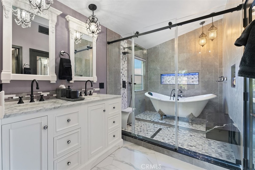 EXQUISITELY REMODELED SMART HOME IN HIGHLY DESIRED ALISO VIEJO, JUST MINUTES FROM FAMOUS LAGUNA BEACH!
Welcome to this, tastefully designed single-family home located in the highly sought-after Laguna Audubon community of Aliso Viejo. This home offers the perfect balance of modern luxury and coastal convenience, just a short 10-minute drive from world-famous Laguna Beach.
Recently remodeled within the last two years, this turnkey home features a wraparound backyard complete with a jacuzzi with a motorized cover, ideal for relaxing and/or entertaining guests. The gourmet kitchen showcases high-end appliances, a built-in wine fridge, and sleek finishes such as GEOLUXE stone countertop designed for both function and style.
Enjoy the benefits of a connected smart home with integrated smart light switches and lighting throughout the house. Located in a quiet, friendly neighborhood with access to top-rated Aliso Viejo schools, this property offers exceptional value and lifestyle.
Whether you're looking to buy a primary residence or a second home near the coast, this home is a rare opportunity in Aliso Viejo you won’t want to miss.
Value adding attributes in 2022-2023, a complete home remodel at a cost of over 150k; Kitchen, bathrooms, doors & hardware, paint walls & ceilings, tile & laminate floor, windows & sliding doors, Jacuzzi, front and backyard landscaping and a new tankless water heater and more.