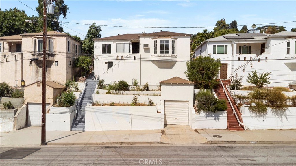 1151 Miller Ave is more than a home, it’s a hillside retreat in the heart of City Terrace. Recently renovated, this 3-bedroom, 2-bathroom residence offers the perfect balance of vintage character and modern style with wood flooring, a cozy fireplace, separate living and dining rooms, fresh interiors, and a bright, open flow throughout. The kitchen is both functional and ready for you to add your personal touch, while the primary suite with a jet tub creates a calming escape. Out back, the covered patio is perfect for morning coffee, weekend gatherings, or a future top garden or ADU, all with hillside views that remind you you’re truly living in LA. A single-car garage and basement provide added storage and flexibility, while upgrades like a newer roof, windows, plumbing, electrical, seismic retrofitting, and fresh paint make this home completely move-in ready. Just minutes from Cal State LA, South Pasadena, Alhambra, DTLA, and easy access to the 10, 710, & 60 freeway this location offers the ideal mix of city access and neighborhood charm. Whether you’re a first-time buyer, a professional looking for a stylish retreat, or a young family ready to grow in an up and coming community, 1151 Miller Ave offers a lifestyle as unique as its setting.