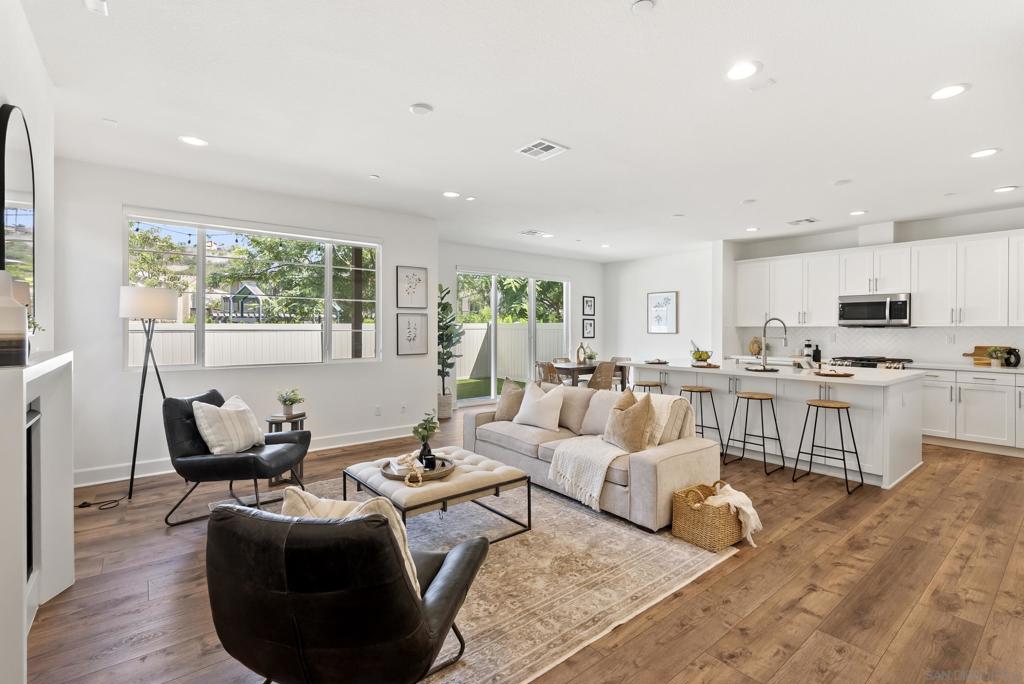 This twin-home offers a corner location with park views and only one direct neighbor! Built in 2020, it’s part of the highly desirable Acacia at the Preserve community. The two-story layout offers 3 bedrooms plus a loft, an attached 2-car garage, and a private fenced yard with a large patio and a second-floor deck providing multiple spaces to enjoy outdoor living. Bright and inviting, the home includes a tankless water heater, A/C, upgraded electrical features, and a stylish kitchen with quartz countertops, a center island, designer backsplashes, stainless steel appliances, and ample storage. Community guest parking is conveniently located next to the unit. Residents have access to a resort-style recreation center featuring a fitness center, beach-entry pool, spa, BBQ area, playground, and outdoor fireplace. The Preserve connects directly to miles of trails that are part of the Carlsbad City trail system and border the Buena Vista Creek Ecological Reserve. The location is close to shopping, dining, and major freeways, making for an easy commute to the beach, airport, or downtown. The home is served by award-winning schools in the Carlsbad Unified School District.