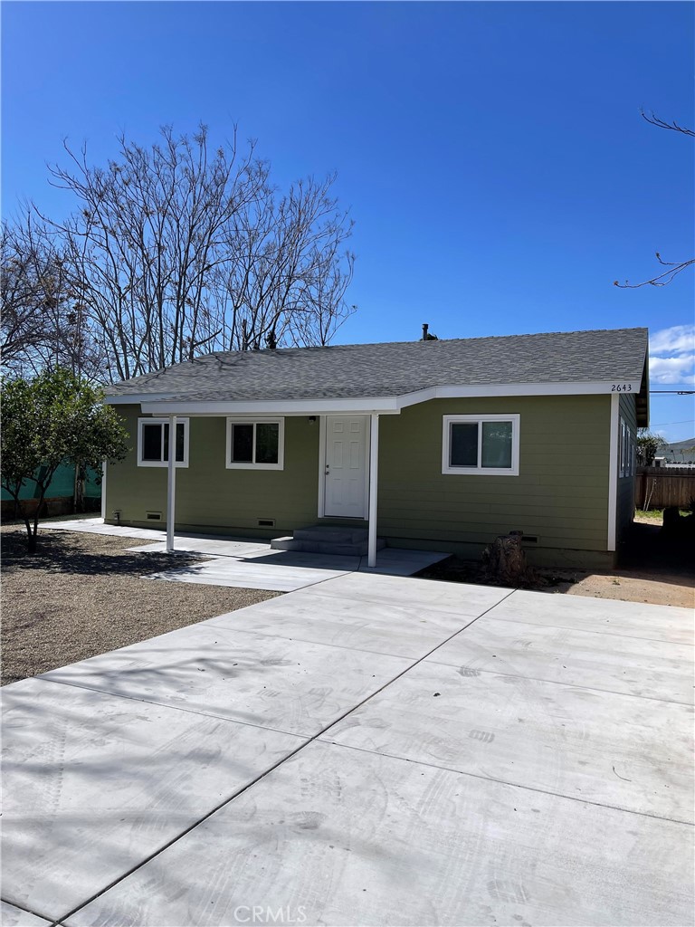 Detached single family residence on a large lot. The home is spacious with recessed lighting and vinyl plank floors. It has everything you need to make it yours. It features 3 bedrooms, 2 bathrooms, storage space in the hallway and a separate laundry room with washer & dryer hook ups inside the house.. Additional features include large closets, an eating area in kitchen and a lime tree in the front yard. The home has a shared driveway with the house in front. The driveway is long and provides access to both this house and the other detached single family residence located at the front of the lot. There are two designated parking spaces in the driveway in front of the house. This home does not have a garage. However, it does have a large storage shed.
