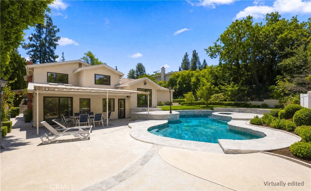 Photo of 4807 Ellenita Avenue, Tarzana, CA 91356 (MLS # SR26161726)