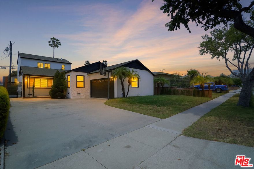 Step into this beautifully reimagined residence, where every detail has been meticulously renovated to deliver the perfect blend of modern luxury and timeless charm. This fully remodeled home features an open-concept floor plan bathed in natural light, luxury wide-plank flooring, recessed lighting, and sophisticated designer finishes throughout. The gourmet kitchen is a true showstopper, boasting crisp white shaker cabinetry, gleaming quartz countertops, and premium stainless steel appliancesoffering both form and function for the culinary enthusiast. The adjacent living and dining areas connect seamlessly, creating a warm and inviting space ideal for everyday living and entertaining.Retreat upstairs to find tranquil bedroom, serene with generous closet space, including a spacious primary suite that features a custom walk-in closet and a spa-inspired ensuite bathroom complete with dual vanities, contemporary fixtures, and a sleek glass-enclosed shower.The home offers multiple fully updated bathrooms showcasing high-end tilework, matte black finishes, and clean, modern aesthetics. One of the bedrooms offers flexibility to serve as a home office, guest room, or creative spacetailored to your lifestyle needs.Step outside to enjoy the private, freshly landscaped backyardperfect for al fresco dining, morning coffee, or weekend lounging. A detached garage and oversized driveway offer abundant off-street parking and potential for an ADU (buyer to verify).Located on a quiet residential street, this move-in ready home is just minutes from major freeways, providing easy access to Downtown LA, the Westside, and beyond. With no expense spared in the renovation, this is a rare opportunity to own a truly turnkey property that combines elevated design, comfort, and unbeatable convenience.