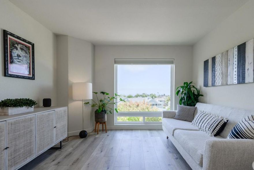 Welcome to this spectacular condo in a coveted development near the ocean with, you guessed it, OCEAN VIEWS right from your living room, family room, bedroom and deck! This home features so much natural light due to not only the expansive floor-plan, but also the numerous double-pane windows throughout including extra side windows due to the fact that this is an end unit with only one neighbor! All living areas have been planned out beautifully with spacious bedrooms and all living areas. The beautiful wood flooring throughout that is very popular today give this home so much class and functionality that also includes durability! Both bedrooms are spacious with plenty of closet space and the primary suite is jaw dropping with its space, seating areas and private bathroom with lots of closet space too. Currently, the primary suite is being used as an entertainment room. Downstairs is a separate family room with a fireplace and access to spacious rear deck and also another bedroom with access to deck. The floor-plan of this home is one of the best you will ever see and experience, so many options and so much thought has gone into the design of this home. Want to go to the beach or play some golf? Heck, you could do both in the same day as it is just down the road!