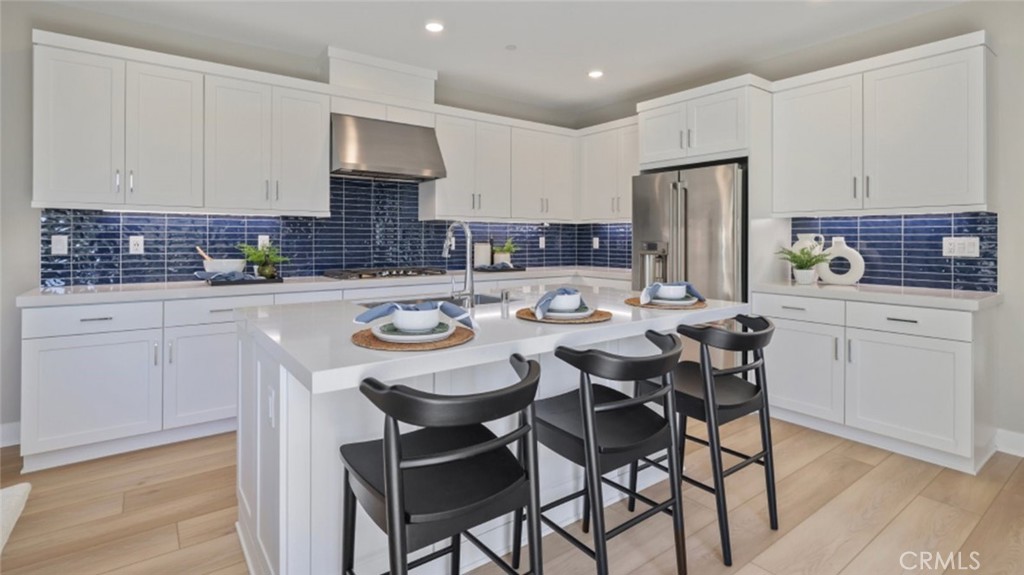 This stunning 2-story, 3 bedroom, 2.5 bathroom smart home offers the perfect blend of comfort and style and large, very bright loft. With a convenient 2-bay garage and exterior single car space, this home has all the space you need for modern living. Nestled in a vibrant community, you'll soon enjoy access to fantastic amenities including a sparkling pool, spa, a welcoming community center, and a sprawling 5-acre city park right in the neighborhood. Park includes 2 basketball courts, 4 pickle ball courts, bocce ball, dedicated dog park, bicycle trails and more! This home and its surrounding offer endless opportunities in a highly sought after, limited availability, established location, with excellent retail options just minutes away. Do not miss out on the chance to make this exceptional property your own.