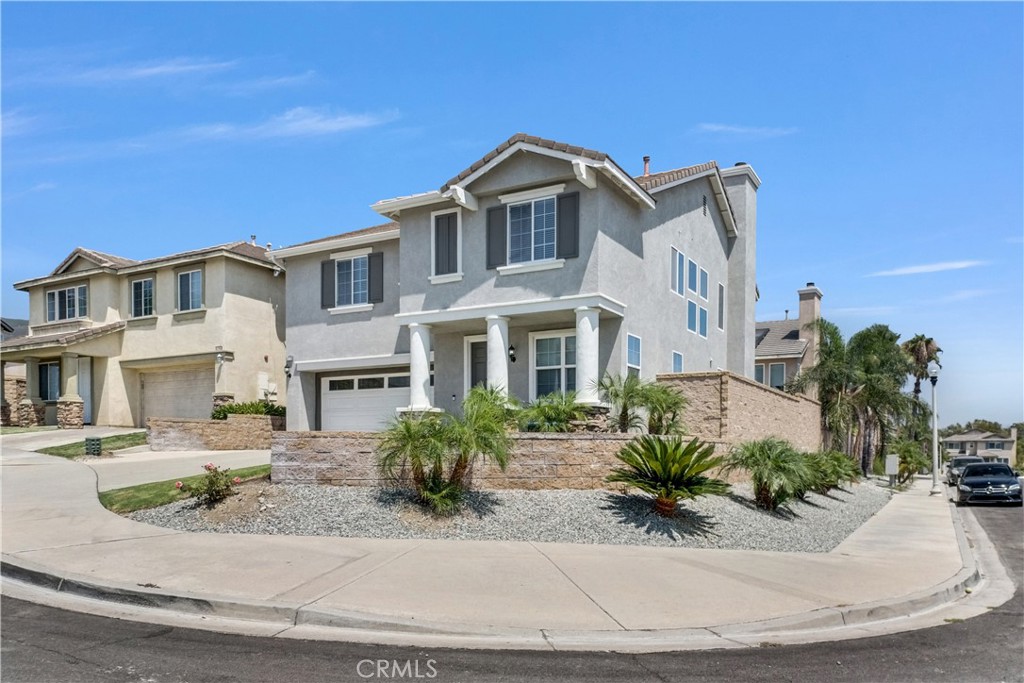 Beautifully remodeled home in North Fontana. Great curb appeal. Front yard has water saving landscape. Fall in love with the open floor plan that this home offers. The kitchen features new quartz countertops, new cabinets, recess lighting, new flooring, new appliances, backsplash, breakfast bar and new paint throughout. Formal dining room, office, fireplace in family room. Storage area underneath the stairs, which has been remodeled; it can be a children's playhouse. Bright, newer and sparkling bathrooms. Double doors lead to the big master bedroom. New water heater. 2-year-old washer and dryer will stay, as well as the fridge. Ceiling fans throughout the house. Newer carpet. Laundry room. Alumawood covered patio. Close to restaurants, shopping and entertainment. Great schools. Etiwanda High School. Park is within walking distance. Minutes from 15, 10 and 215 Fwys. Close driving distance to Victoria Gardens, Ontario Mills, the Renaissance shopping center and Ontario International airport. Must see to appreciate. All information is deemed reliable, buyer to verify.