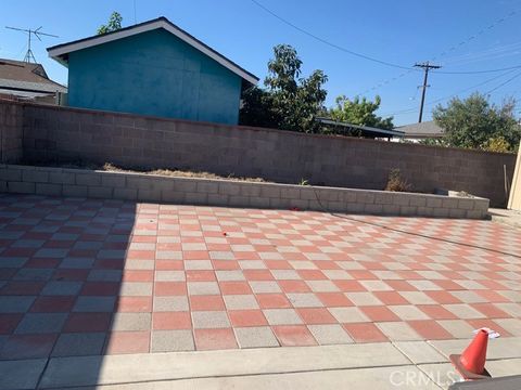 Photo of 11425 Alburtis Avenue, Norwalk, CA 90650 (MLS # IV26012369)
