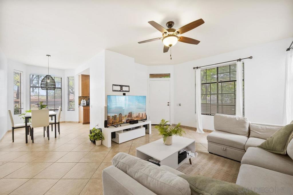 Arborlake complex- Upgraded, first floor, corner unit. Upgrades include flooring, kitchen, baths, lighting, closet doors and closet inserts by "Closet Works." Jacuzzi tub in master w/ granite counter tops. Community pool spa, water features give a zen feel in the heart of Carmel Valley. Walk to Del Mar shopping, dining, top rated schools, parks and so much more. Approx 10 minute drive to Del Mar Beaches.