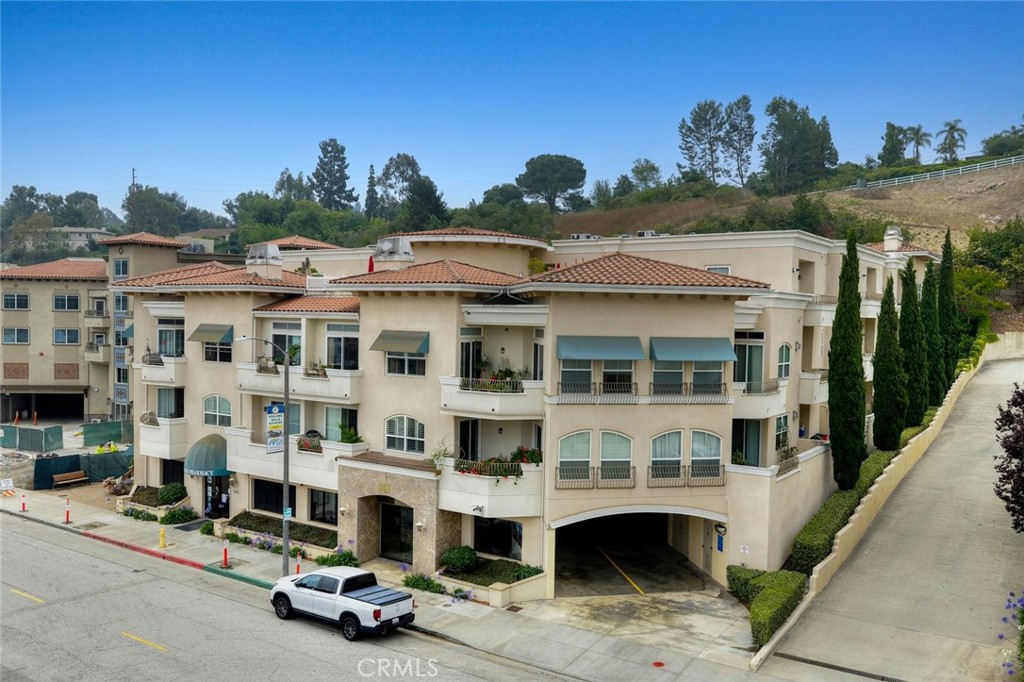 Welcome to this beautiful two bedroom and two bath condo in a serene 55+ community located in the heart of Rolling Hills Estates. Upon entry, light and earthy hues of the new travertine tiles offer a warm and inviting ambiance. Crown molding throughout entry way and living room. Engineered hardwood flooring in living room with cozy gas fireplace activated by switch. New carpet in bedrooms. Granite counter tops in the kitchen and bathrooms, stainless steel appliances and newer gas range. There is a storage locker in the garage area. Community amenities include elegant lobby, fountain in the interior atrium courtyard and roof top deck on the 3rd floor complete with tables, chairs and BBQ for homeowners to enjoy. Close to shops, restaurants and the Promenade on the Peninsula.