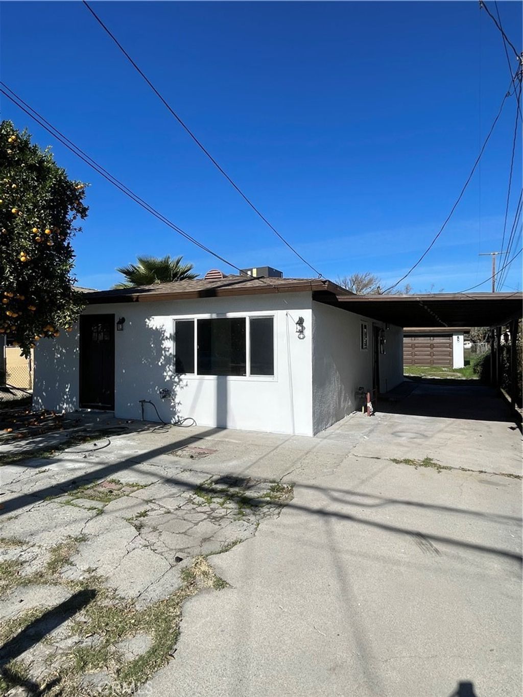 Photo of 1424 W 9th St, San Bernardino, CA 92411 (MLS # IV26010805)