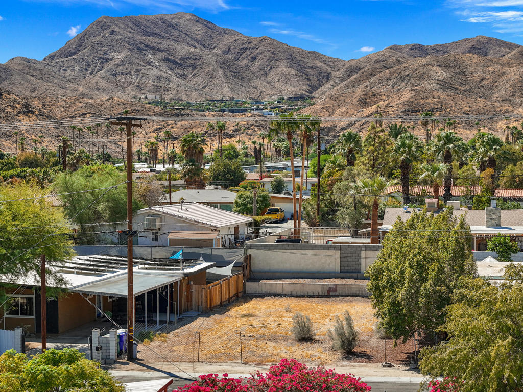 Opportunity knocks! Calling all Builders, Investors and Land Barons , Seller is open to carrying on this gorgeous lot nestled in popular Cathedral City Cove - walking distance to fine dining, bars, entertainment and soon to be Cathedral Cove Shopping Center. Great views and plans are attractive (drive by completed homes on same street). Survey complete, plans included (Buyer will need to have solar and sprinklers added in). Paid water meter, survey completed, Amazing south and western mountain views! Whether you are looking to build for yourself, build and sell or just hang on to the land as an investment, you don't want to miss out on this opportunity!