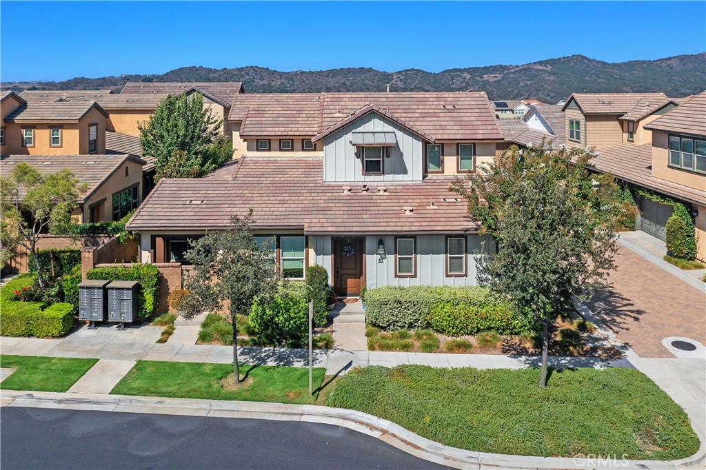Welcome to the elevated 55+ resort-style community in Rancho Mission Viejo. This immaculate home has 3 Bedrooms and 3 full baths in just over 1,760 square feet. The entry flows right into the open kitchen with a large center island featuring quartz counters and stainless appliances. The 5 burner cooktop is framed with an elegant backsplash and under cabinet lighting. The large Primary is on the main level and includes a spa-like bath with a zero clearance shower with bench seating. The 2nd main floor bedroom is adjacent to a full bath. This makes for a great guest room or office. The laundry room is on the main level for ease of use and has beautiful upper and lower cabinetry and a nice quartz counter for work space. Upstairs is an additional Bedroom with a spacious loft area that can be used for games, movie nights or a private getaway for guests. The upstairs loft also features another full bath. The community of Gavlan at Rancho Mission Viejo is resort like with access directly above the property to Hilltop pool and social areas and also the Lookout pool and BBQ area. As part of the Gavlan over 55+ community, you will have access to all the beautiful pools, fitness centers, social clubs and events that make being a part of this community a very sought after feature.
