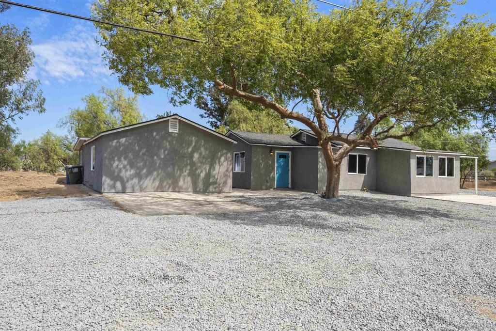Beautifully renovated 3 bed, 2 bath home in Ramona, situated on over 2 FLAT acres just off Hwy 67. Close to the main road yet tucked back for peace and tranquility. This move-in ready property features a main house plus a 1 bed 1 bath ADU, offering versatile living options. Extensive updates throughout make this the perfect blend of modern comfort and country charm.