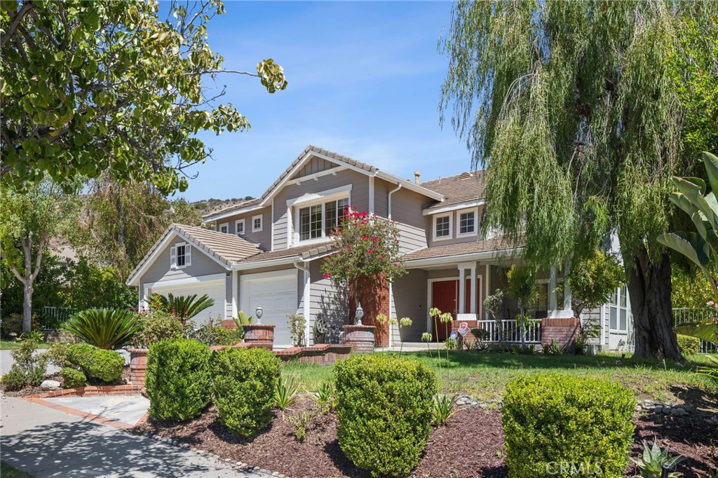 Welcome to the Elegant home on a a cul-de-sac street in Stonegate, West Hills. This beautifully maintained property features 5 spacious bedrooms and 3 bathrooms. Extra bonus room is a versatile loft ideal for a home office. Short term,6 month is available. The home includes hardwood floors, vaulted ceilings, and recessed lighting. Step inside to discover an inviting open floor plan, showcasing a bright and airy living room that seamlessly flows into a dining area with fireplace and a wine fridge. The fully equipped kitchen comes with granite countertops and stainless steel appliances. The Master suite offers a private retreat with an en-suite bathroom, while the additional bedrooms provide flexibility for guests. There is a separate laundry room inside the home. The entertainer’s backyard with a pool, bar area, and expansive views of nature is ideal for entertaining or relaxing. Located in a top-rated school district. Garage 2 car. Also there is ample driveway parking available. Landlord covers gardening, pool maintenance, and HOA fees. Centrally located near parks, shopping, restaurants, hiking trails, and a short drive to the beach. Ready for move in now.!