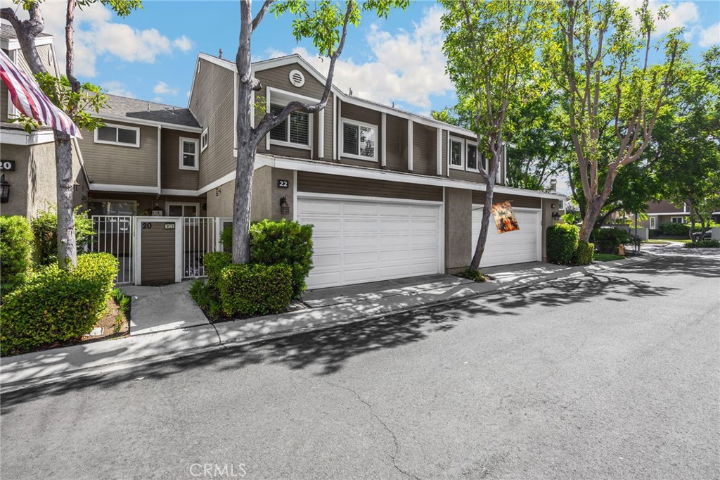Step into this beautifully updated residence in the heart of Aliso Viejo, where comfort meets sophistication. Featuring 3 spacious bedrooms, 2.5 baths, and a 2-car attached garage, this home is designed for modern living and effortless entertaining. The main level showcases laminate flooring throughout, soaring cathedral ceilings in the family roo, and a cozy wood burning fireplace. New sliding glass doors open to a charming patio with pavers, a vinyl patio cover, and a built-in BBQ-perfect for weekend gatherings or quiet evenings under the stars. The open kitchen boasts crisp white cabinetry and flows seamlessly into the adjacent dining room, also with new sliders for easy indoor-outdoor access. A convenient powder room completes the downstairs layout. Upstairs, the primary suite offers vaulted ceilings, plantation shutters, ceiling fan, custom closets, and spa inspired bathroom upgrades that create a serene retreat. Secondary bedrooms feature matching laminate flooring, plantation shutters, updated closets. The remodeled secondary bathroom adds a touch of luxury for guests or family. This home has been re-piped. Refrigerator and washer/ dryer are included. Enjoy Resort- Style amenities including a lap pool, jacuzzi, kids pool, gym, clubhouse, tennis courts, and lush greenbelt areas. Blue-ribbon schools! Ideally located near shopping, toll roads, golf course, hiking trails, and just minutes from iconic Laguna Beach. No Mello Roos and Low property taxes. This is the one you’ve been waiting for-schedule your showing today!