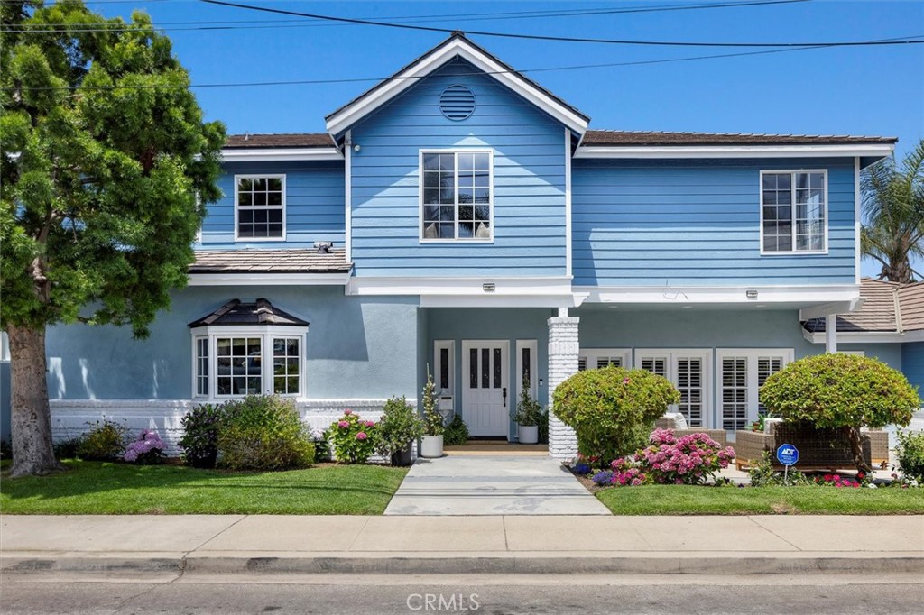 Discover coastal charm in this stunning Cape Cod style home, ideally situated on a sought-after south-facing corner lot in Manhattan Beach. Spanning roughly 3,400 (btv) square feet, this inviting residence sits on a spacious 7,444 square foot lot, offering an abundance of room for both relaxation and entertainment.The home features 4 bedrooms and 2.5 bathrooms, thoughtfully designed to blend comfort with functionality. The updated kitchen, a central hub for gatherings, boasts cozy banquette seating for six, making it perfect for casual family meals. Enjoy seamless indoor-outdoor living with front and back yard spaces designed for entertaining. The den, equipped with a wet bar and a sizable wine refrigerator, is perfect for hosting guests or unwinding after a long day. Upstairs, a serene nook provides an ideal spot for a home office or a peaceful reading corner. Here, you will embrace the quintessential Manhattan Beach lifestyle in this entertainer's paradise, where luxury and comfort meet in perfect harmony.