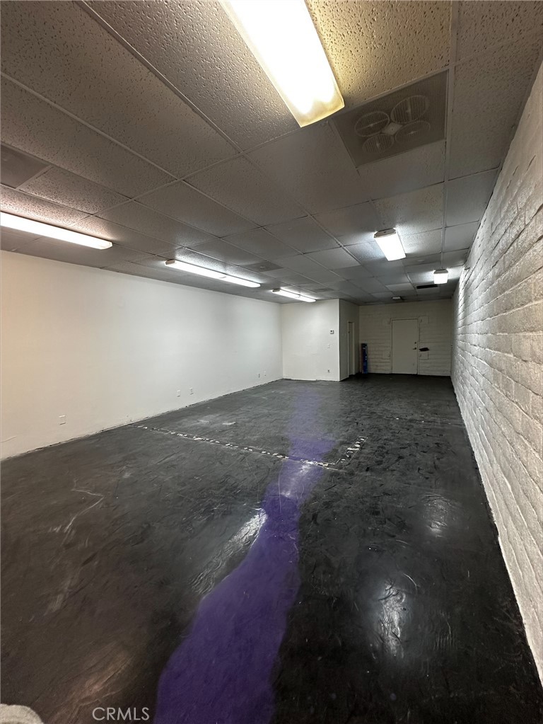 Now Available!!! For LEASE, Unit 21 offers a flexible commercial space located in the well-known Tower Center along busy Highway 18. This suite features a private office, open work area, and private restroom, making it ideal for a wide range of professional, service-based, or retail businesses. Approximate size: 750 sqft. Includes Private office + open floor plan. Located in a high-traffic corridor with professional and medical neighbors.