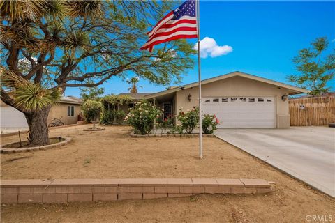 Photo of 57373 Pueblo Trail, Yucca Valley, CA 92284 (MLS # JT26098436)