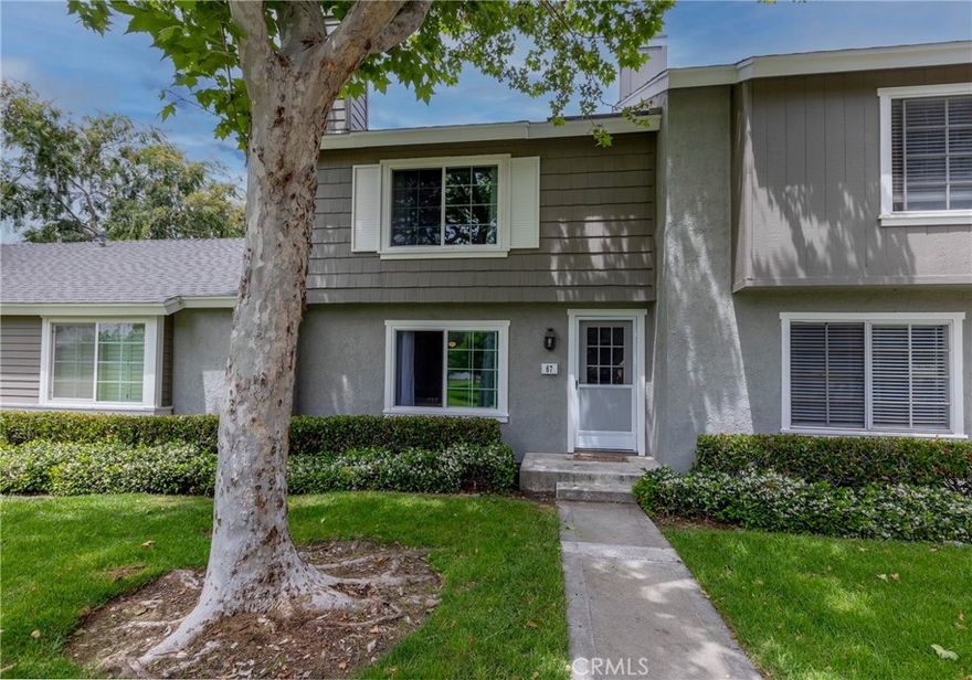 Welcome to this 2-bedroom, 1.5 bath home in the sought-after Woodbridge community of Irvine. The bright main living area features large windows and an easy, functional layout. The kitchen offers stainless steel appliances, ample storage, and a cozy dining nook. A convenient half bath downstairs adds everyday functionality. Upstairs, two bedrooms provide generous closet space and a full bath with modern finishes. Enjoy a private patio for relaxing or entertaining and covered parking for added convenience. This home is set in one of the best locations within the complex, overlooking a beautiful, expansive park area. Ideally situated next to Meadow Park, Meadow Park Elementary School, and South Lake Middle School, with South Lake just a short walk away for scenic trails and recreation. Residents enjoy access to Woodbridge amenities, including pools, parks, and lakes, plus close proximity to shopping, dining, and transportation.
