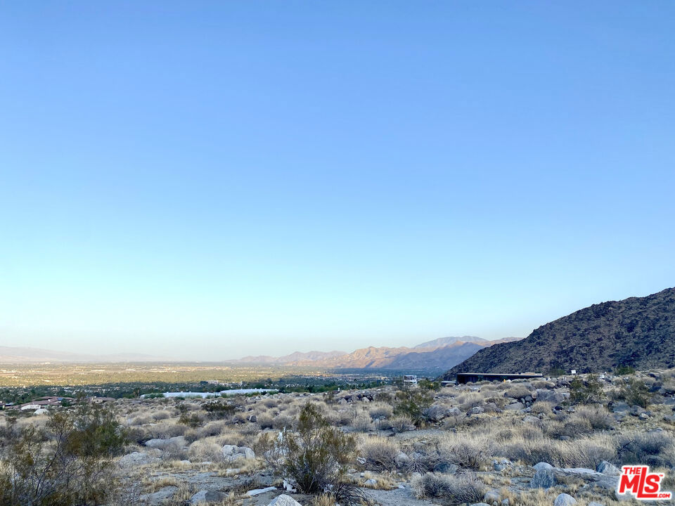 LOT 8 - Discover the epitome of desert luxury living in the prestigious Desert Palisades Subdivision. This particular property offers an unparalleled level of privacy and breathtaking panoramic views. Collaborate with world-renowned architects to create a home that perfectly complements the breathtaking surroundings. Don't miss your chance to secure this prime piece of desert real estate, where privacy, views, and architectural excellence converge to create an extraordinary living experience. Some photos are renderings done by Sean Lockyer of Studio AR&D Architects. Architectural plans are available upon request, but the choice is yours - bring your vision to life. There is no structure on the lot.