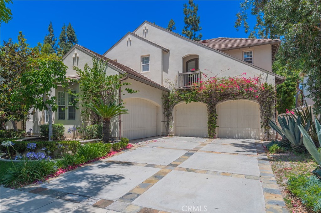 Spectacular Mini-Estate in Rosegate Gated Community. Award winning Taylor Woodrow designed located in one of the most prestigious communities found in Irvine. Walking distance to some of the best schools in the nation. Beautiful tree-lined neighborhood. Amazing floor plan with rare 4 car garage, guest suite and office downstairs. Gorgeous hardwood floor throughout downstairs. The gourment kitchen has top of the line built-ins, granite counters, butler pantry, Viking range with island built for entertaining. Breakfast nook opens to serene patio and a large great room w/fireplace. Upgrades including custom cabinets, wood flooring, and custom built-in closet in every bedroom. Huge master suite with custom built-in walking closet. One of the BEST floor plans. 4-Car garage. Community amenities including Citrusglen Tennis Center, Meadowood Swim Center and private access to Hicks Canyon Hiking Trails. Walking distance to Canyon View Elementary and Northwood High School.