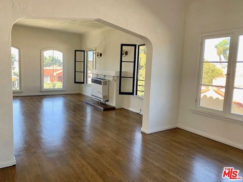 Photo of 2924 1/2 12th Avenue, Los Angeles, CA 90018 (MLS # 25602803)