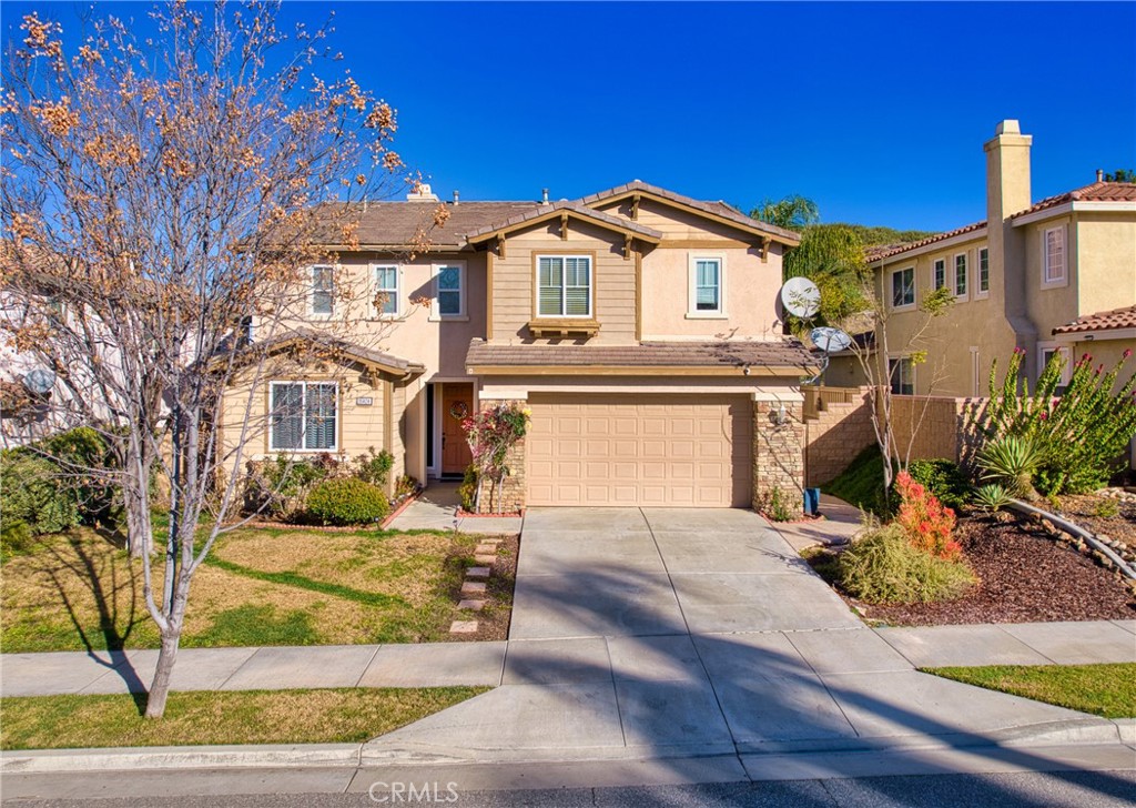 Welcome to this gorgeous 2-story 4-bedroom, 3-bathroom home with views of the hillside in the desirable Canyon Hills community, boasting approx. 3023 SF of thoughtfully designed living space, sitting on approx. 6098 SF lot. The open floor plan flawlessly integrates functionality and style, featuring a gourmet kitchen with granite countertops, maple cabinets, stainless steel appliances, and a kitchen island. The first floor offers a bedroom, full bathroom, living room with soaring high ceilings, a cozy fireplace, and a kitchen opening into a light and bright family room. The second floor features a spacious prime bedroom with its fireplace, an ensuite bathroom with a jetted tub, separate shower, dual sink vanities, and His and Her walk-in closets. Additionally, on this level, there are two more guest bedrooms, a shared bathroom, a laundry room, and a relaxing family room in the loft. The loft area could also be perfect for a game room, kids’ space, or office. There’s direct access from a 3-car garage and ample parking on the driveway and the street. The outdoors offers desirable privacy and is perfect for enjoying evenings with a glass of wine, equally great for relaxing with family and hosting guests. The seller is downsizing and most of the furniture is also for sale. Beyond the great features of this beautiful home, Canyon Hills offers an unparalleled lifestyle —featuring 3 resort-style pools with parks, an 18-acre sports park, dog parks, hiking trails, tennis courts, and highly acclaimed Blue Ribbon elementary and middle schools. Priced to sell, this home offers excellent value in a desirable location. Don't miss the opportunity to make 35424 Saddle Hill Rd your new home. Schedule a viewing today and experience the charm and comfort this Canyon Hills residence has to offer.