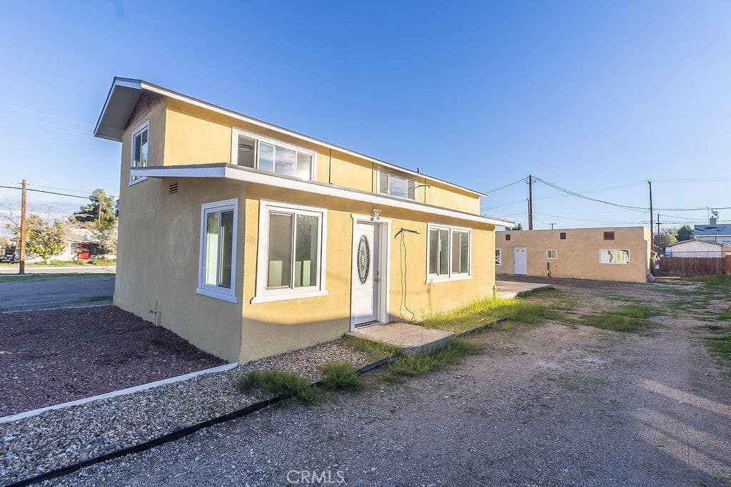 Photo of 107 Walnut St, Needles, CA 92363 (MLS # JT26130931)