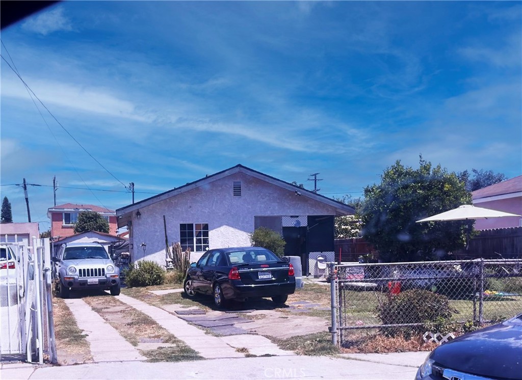 11150 Franklin St. is a well-built, spacious 3-bed/2-bath single-story home on a large lot with solar panels and strong family appeal. The home itself is larger than most you can find in this location-- it has a master bedroom with an on-suite bathroom. It also features a bonus space that can be used as an office and two living areas. It’s primed for renovation that can elevate appearance, comfort, and value— whether for living or as an investment. With a blend of classic charm and green energy savings, it offers tremendous upside in a desirable Lynwood location.