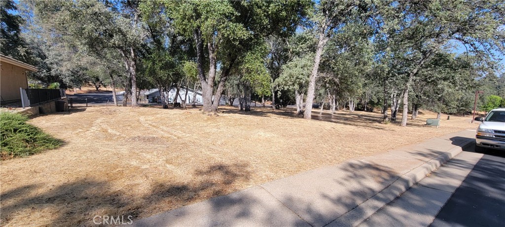 Here it is! The location of your forever dream home! This lot is located in the beautiful rolling hills of Mariposa village. Within this gated community located atop a hill only a few minutes outside of downtown Mariposa. This lot is a great location for your build. It has electricity, water, sewer and phone, all ready to be connected. The neighborhood of Italian Acres is beautiful. The houses are all kept up and the neighborhood maintained, thanks to the Housing Association (HOA) of Italian Acres. Live in the mountains with the accessibility of the city streets. These lots are not available often and there are not many left. Come see it today!